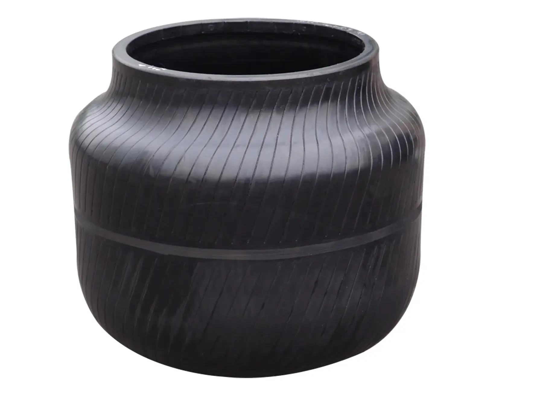 Unidentified cylindrical tire curing bladder with diagonal surface grooves